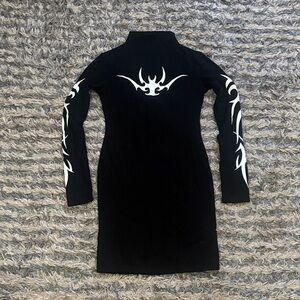 Elegant Black Dress with White Tribal Accents